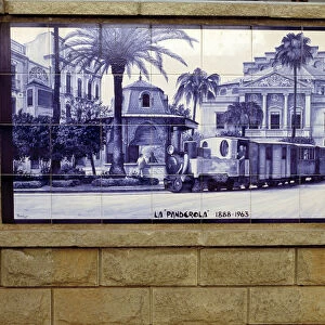 Tile panel representing the old train the Panderola that crossed the city of Castellon