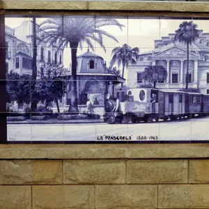 Tile panel representing the old train the Panderola that crossed the city of Castellon