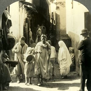 Turbaned Men and Veiled Women Crowd this Narrow Street in the Arab Quarter of Algiers Algeria