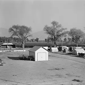 View of Kern migrant camp, community center at left, California, 1936. Creator: Dorothea Lange