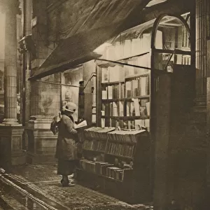 Wet Winter Evening and a Book Lover in Bloomsbury, c1935. Creator: Fincham