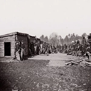 [Winter Quarters, troops with row of cabins]. Brady album, p. 128, 1861-65