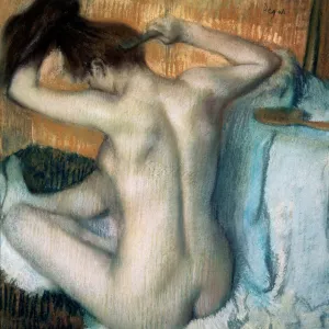 Woman Combing Her Hair, 1886. Artist: Edgar Degas