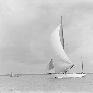 The yawl Sumurun running downwind with spinnaker, 1922. Creator: Kirk & Sons of Cowes