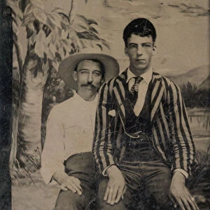 Young Man in a Striped Jacket, Sitting on the Lap of Another Man in Front of Painted