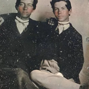 Two Young Men Seated with Their Arms Around Each Other, 1860s. Creator: Unknown