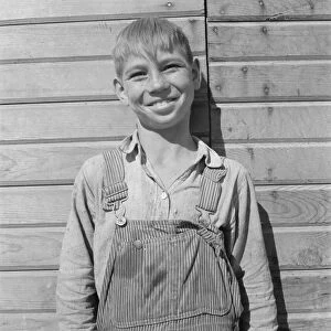 One of the younger Cleaver boys on new farm in Malheur County, Oregon, 1939. Creator: Dorothea Lange