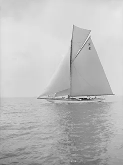 The 10 Metre class Eleda (F6) sailing close-hauled, 1913. Creator: Kirk & Sons of Cowes