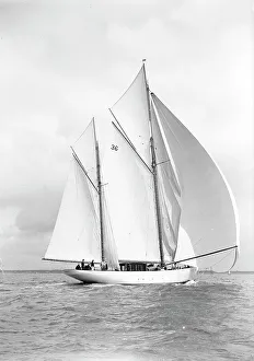 Edgar Wp Prints: The 105 ft ketch Thendara sailing with spinnaker. 1939. Creator: Kirk & Sons of Cowes
