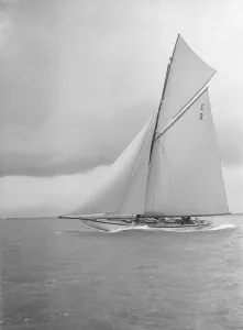 The 12 Metre Ierne sailing close-hauled, 1912. Creator: Kirk & Sons of Cowes