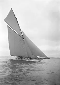 The 12 Metre yacht Javotte sailng close-hauled, 1911. Creator: Kirk & Sons of Cowes