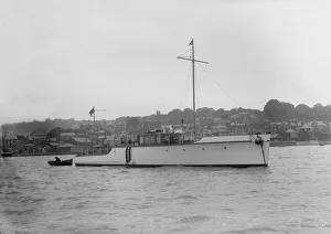 Motor Yacht Prints: The 12 ton motor yacht Cordon Rouge at anchor, 1923. Creator: Kirk & Sons of Cowes