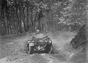 1496 cc Singer competing in the B&HMC Brighton-Beer Trial, Fingle Bridge Hill, Devon, 1934