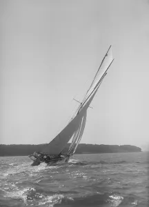 The 15 Metre cutter Ostara sailing close-hauled, 1911. Creator: Kirk & Sons of Cowes