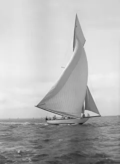 Mylne Collection: The 15-metre cutter Ostara sailing downwind, 1911. Creator: Kirk & Sons of Cowes