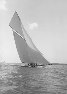 The 15 Metre Hispania sailing close-hauled, 1911. Creator: Kirk & Sons of Cowes