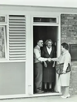 Front Door Prints: 16 Candy Street, Poplar, London: elderly couple greet Welfare Officer
