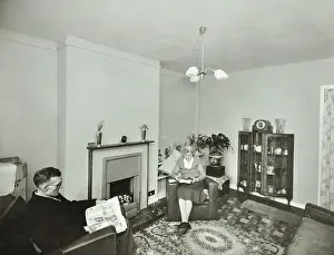Poplar Tower Hamlets London England Prints: 16 Candy Street, Poplar, London: elderly couple in a new flat, 1962. Creator: Unknown