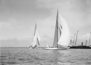 The 19-metre class Mariquita (C1) & Corona (C3) running with spinnakers up, 1911