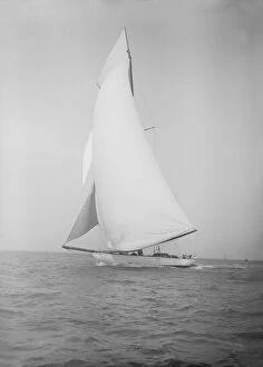 The 19-metre cutter Norada sails in a following wind, 1911. Creator: Kirk & Sons of Cowes