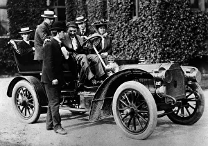 Barney Prints: 1905 Peerless type 10 with Barney Oldfield. Creator: Unknown
