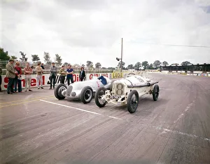 Start Prints: A 1914 and 1937 Grand Prix Mercedes racing cars at the starting line