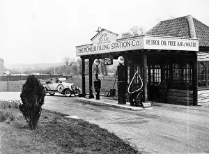 Garage Prints: 1923 10 hp Calcott arriving at a petrol station, (c1923?)