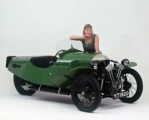 Model Gallery: 1927 Morgan Aero 3 wheeler with female flapper model. Creator: Unknown