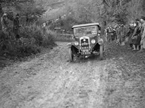 1928 Austin 12 / 4 4-seater tourer taking part in the Inter-Varsity Trial, 1930. Artist: Bill Brunell