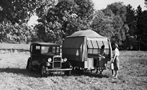 Hutchings Prints: 1930 Austin Seven with trailer caravan. Creator: Unknown