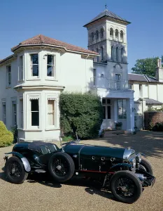 Bentley Prints: A 1930 Bentley Supercharged outside a house