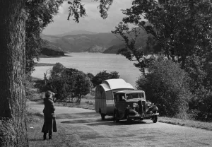 1934 Standard Sixteen with caravan. Creator: Unknown