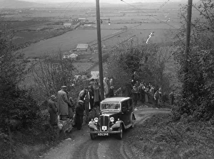 Standard 10 Prints: 1934 Standard Ten taking part in a Standard Car Owners Club trial. Artist: Bill Brunell