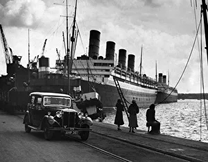 Waterfront Gallery: 1935 Daimler Light 15 with the liner Aquitania at Southampton docks, Hampshire