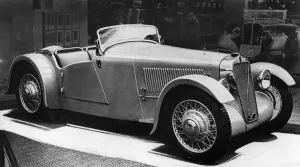 Motor Show Prints: 1935 Georges Irat at a motorshow. Creator: Unknown