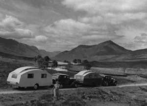 1936 Austin Twenty with caravan and 1936 Oldsmobile Eight with caravan. Creator: Unknown
