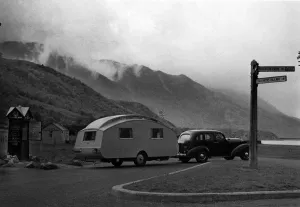 1936 Oldsmobile Eight with caravan in Scotland. Creator: Unknown 1936 Oldsmobile Eight with caravan in Scotland. Creator: Unknown