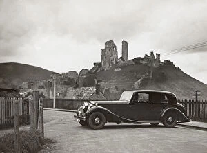 Corfe Castle Gallery: 1938 Daimler 4.5 litre saloon at Corfe Castle, Dorset. Creator: Unknown