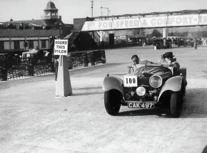 Brooklands Prints: 1938 S.S. 100 at Brooklands suring Junior Car Club event 25th March 1939