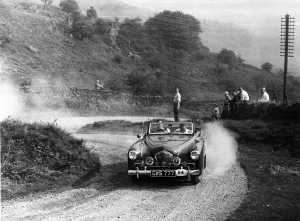 Healey Prints: 1949 Healey 2. 4 Sportmobile drophead coupe, Morecambe rally 1952. Creator: Unknown