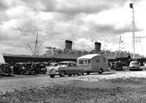 Ford Zephyr Prints: 1952 Ford Zephyr towing Winchester Pipit caravan Queen Elizabeth in B / g Creator: Unknown