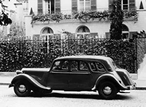1954 Citroen 15CV Familiale parked outside a house