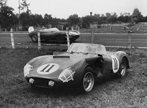 1955 Le Mans, Hawthorns Jaguar D type passes de Portagos stricken Ferrari. Creator: Unknown