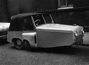 Parking Prints: 1956 Gordon 3 wheeler parked in street. Creator: Unknown