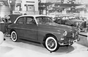 Motorshow Prints: 1956 Volvo 120 Amazon at motor show. Creator: Unknown
