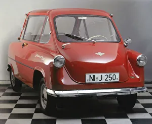 Small Prints: 1958 Zundapp Janus microcar. Creator: Unknown