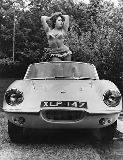 Swimwear Gallery: 1959 Elva with posing female model. Creator: Unknown