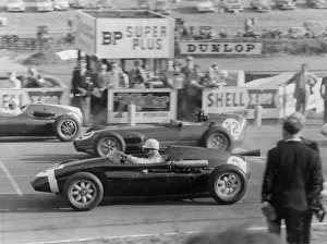 Race Collection: 1959 Stirling Moss in Cooper Borgward, next to Graham Hill in Lotus Climax. Creator: Unknown