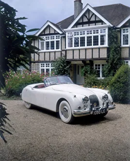 White Walled Tyre Prints: 1960 Jaguar XK 150