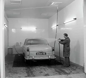 Cleaning Prints: A 1961 Austin Westminster in a car wash, Grimsby, 1965. Artist: Michael Walters